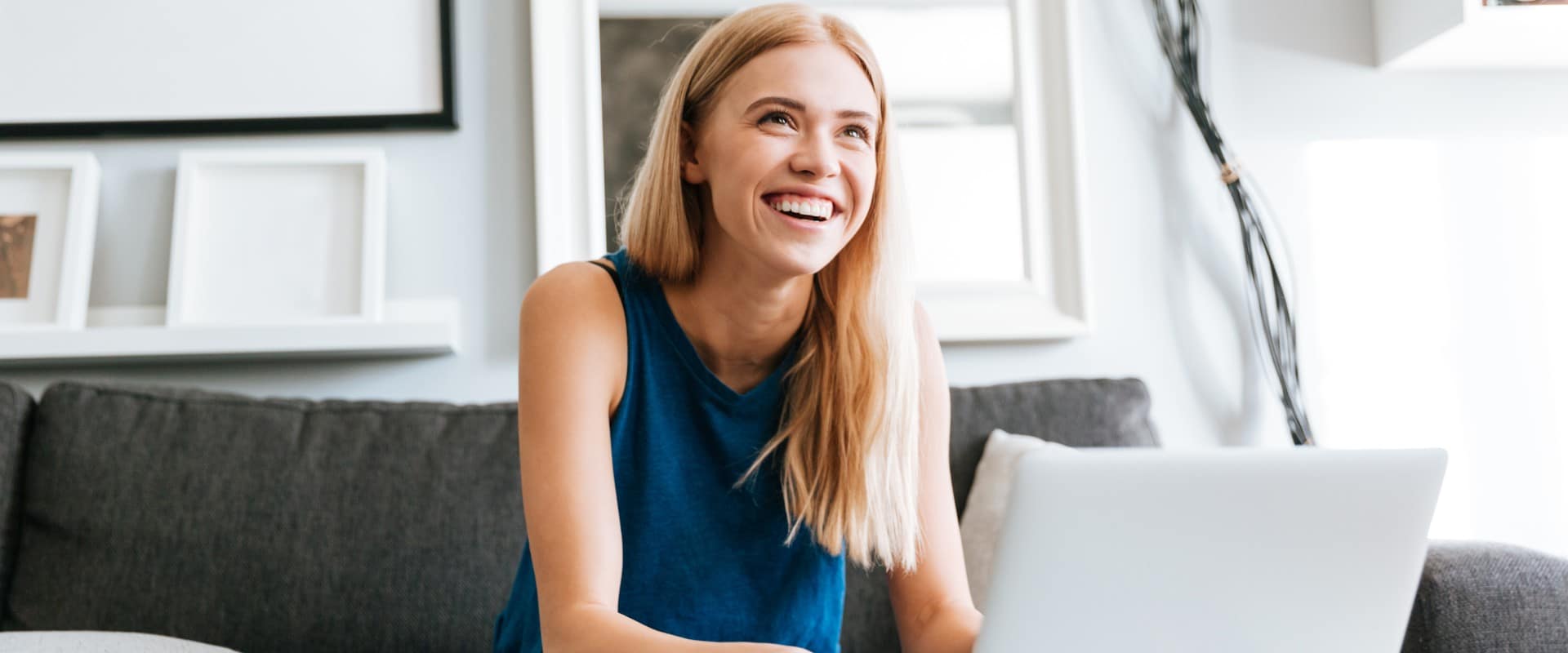 Домашнее более. Любимая работа п Shutterstock. Ольга Шваб Афина турагентство. Woman laughing at Laptop.